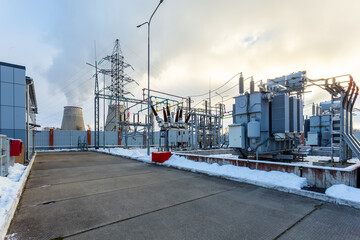 Obraz premium Electrical transformer, equipment for stepping up or stepping down voltage, high voltage power plant