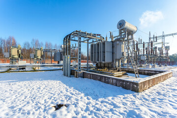 Obraz premium Electrical transformer, equipment for stepping up or stepping down voltage, high voltage power plant