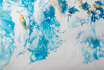 Fluid acrylic painting in blue and gold colors