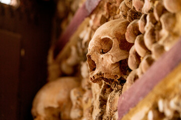 Skull and bones build into a wall in a chapel in Portugal
