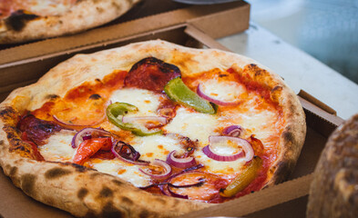 Traditional Italian pizza Neapolitan style baked in wooden oven 