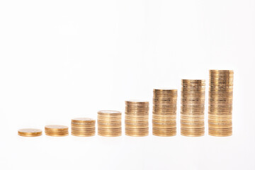  Close-up of coins stack on white background. 