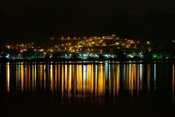 Fototapeta na wymiar night view of the city with light reflections