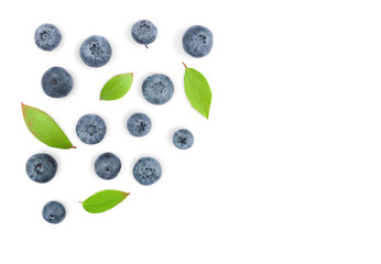Scattered ripe great blueberry with leaves isolated on white background top view   