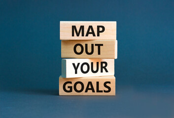 Support and map out your goals symbol. Concept words Map out your goals on wooden blocks on beautiful grey table grey background. Business, support and map out your goals concept