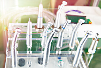 Dental contra angle handpieces in store - obrazy, fototapety, plakaty