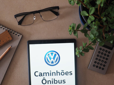 In This Photo Illustration, Volkswagen Caminhões E Ônibus Brand Of Traton Group Logo Seen Displayed On A Tablet