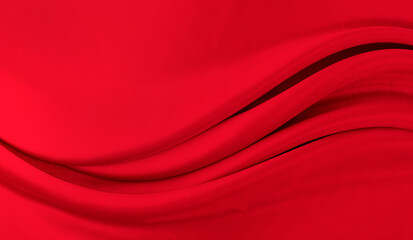 Black red satin dark fabric texture luxurious shiny that is abstract silk cloth background with patterns soft waves blur beautiful.