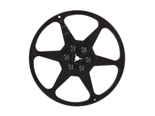 Empty vintage 8mm movie film reel isolated.