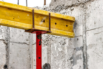 Formwork for pouring the second floor of a monolithic building. Reinforcement of walls and ceiling. Monolithic work during the construction of a building close-up. Construction technologies.
