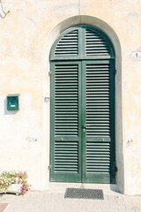 Fototapeta na wymiar Old and traditional doors of the Tuscan seaside houses
