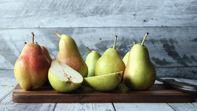 slice of fresh pears on table close up 