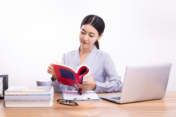 Business women reading at their desks