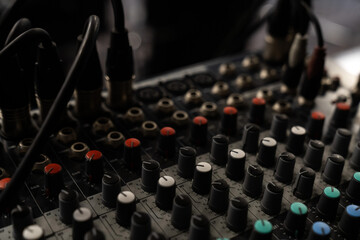 Mixer control. Music engineer. Backstage controls on an audio mixer, Sound mixer. Professional audio mixing console with lights, buttons, faders and sliders. sound check for concert.