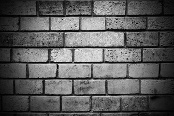Black and white stone brick wall obsolete vignette background