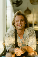 Man smokes a cigarette, close-up portrait, lifestyle.