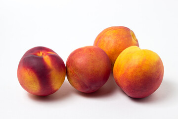 Fototapeta na wymiar Nectarine isolated on white background. Ripe and tasty fruits