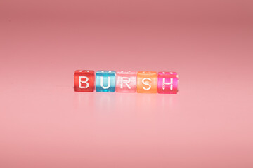 the word "bursh" made up of cubes