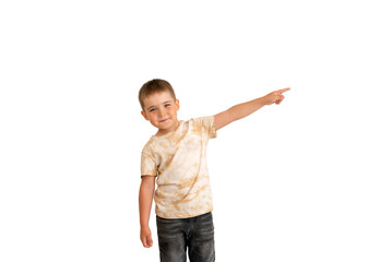 little boy shows a finger to the side on a white isolated background. child shows