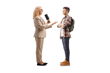 Female reporter interviewing a male student