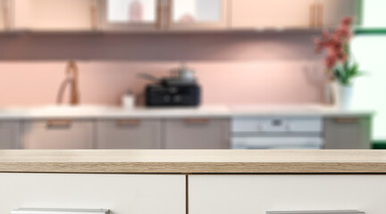 Desk of free space and kitchen interior. 