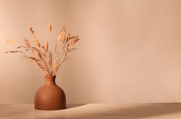 Vase with dried grass