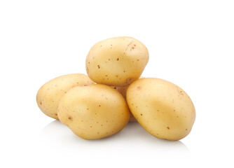 Raw whole potatoes close up isolated on white background