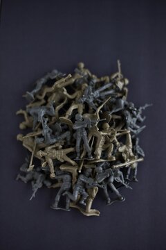 A pile of plastic toy soldiers. 