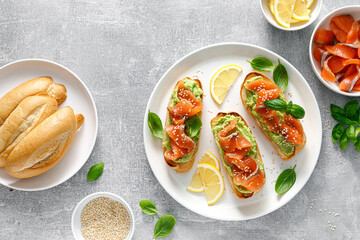 Toasts with salted salmon and avocado guacamole, top view