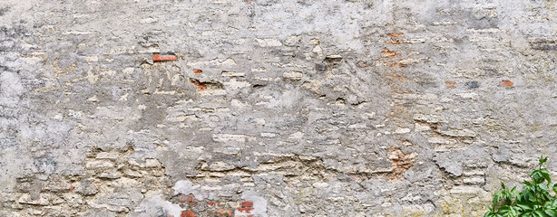 Old brick wall, detail, in poster format.