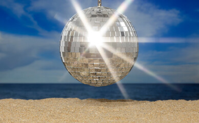 A discoball on the beach