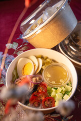 tuna and egg salad in a craft dish top view