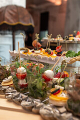 various snacks and drinks on the table at the event