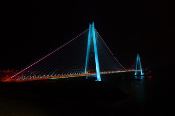 Obraz premium bridge at night neon light