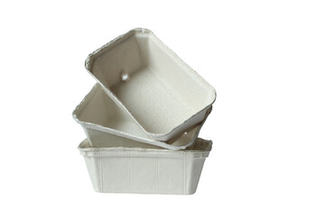 Biodegradable food trays made from pressed cardboard isolated on white background. Closeup