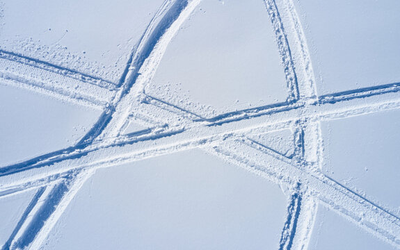 Aerial View Of Snowmobile Tracks