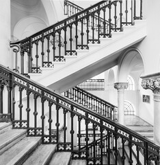 vintage white staircase in the building