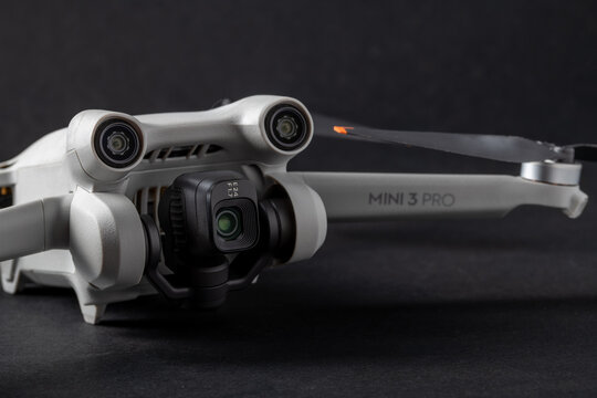 Antalya, Turkey - September 15, 2022: Mini 3 Pro drone of Dji brand with Vertical camera on dark background