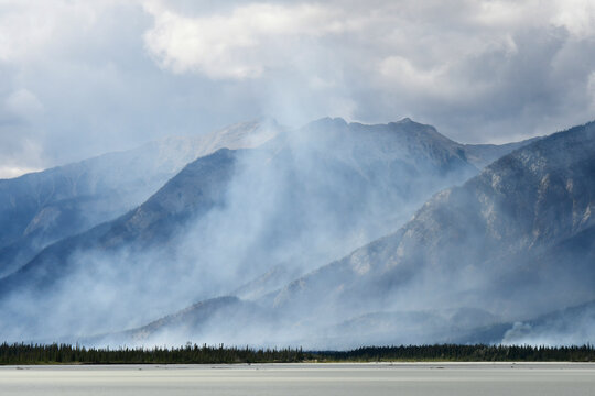 An image of thick grey smoke from a forest fire in Jasper National Park. 