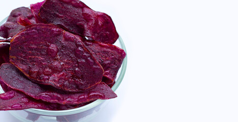 Purple sweet potato chips on white
