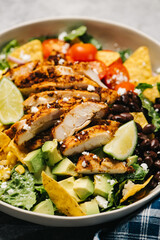 Close-up Chicken Taco Salad with lime