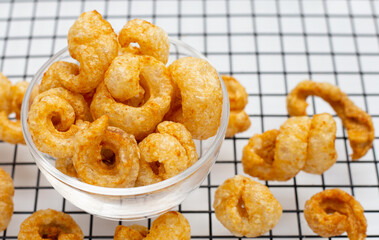 Crispy pork rinds or pork snack.