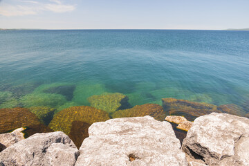 Rocks of a breakwater in the lake