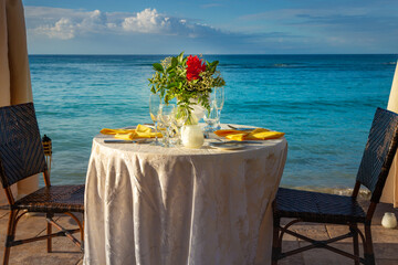 Romantic dinner: table for two and Beach Montego Bay at sunset - Jamaica