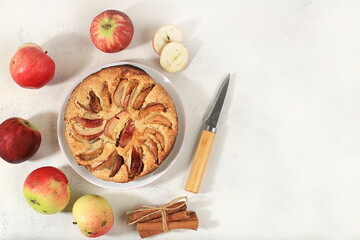 Kitchen background with apple pie, honey, apples, spices, cozy warm concept, hello autumn, hygge...