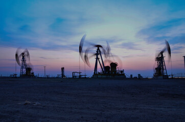 Drilling rig at sunset