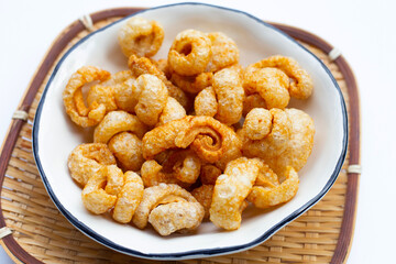 Crispy pork rinds or pork snack.