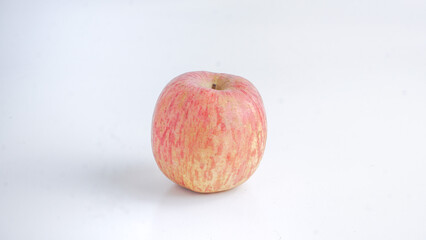 Pink fuji apples isolated on white background