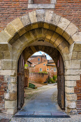 The stone entrance of a medieval village