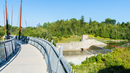 Suspended pedestrian bridge in Milne Dam Conservation Park, Markham, Ontario, Canada